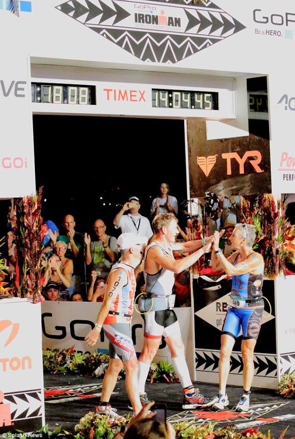 High-five - Gordon shares his joy with fellow competitors on completing the race